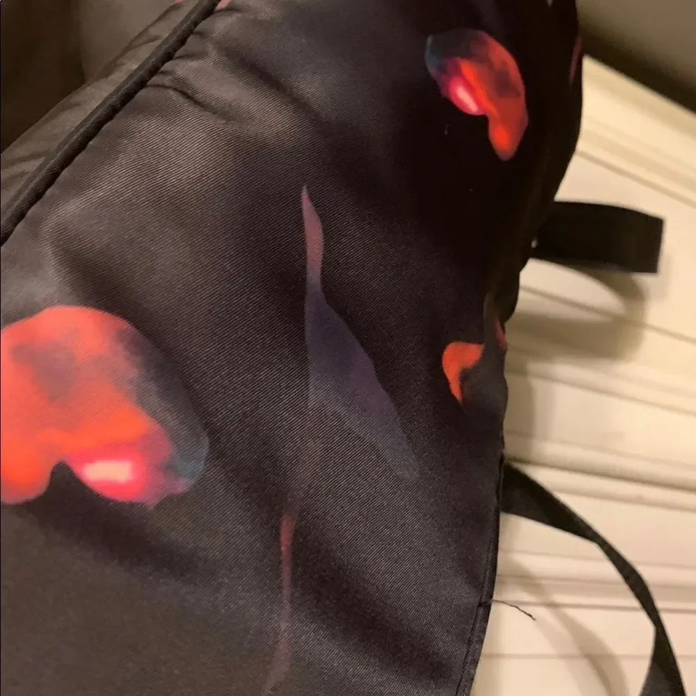 classic backpack and shoulder bag with antitheft design, abstract colors